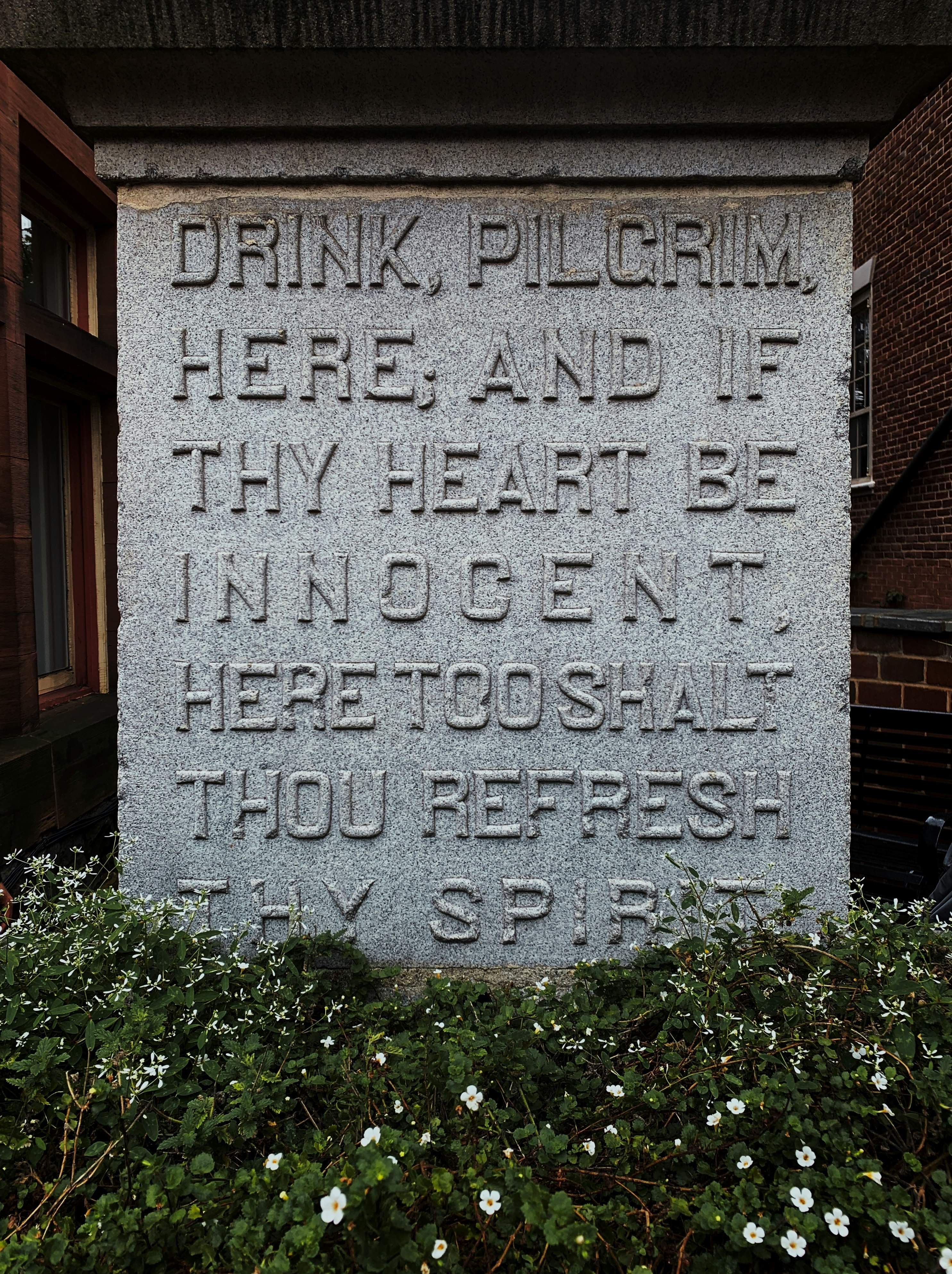 Drink, Pilgrim Here, and If Thy Heart Be Innocent concrete sign